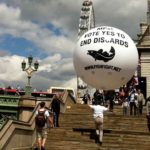 FishFight campaign sphere being carried up steps near London Eye