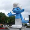 Huge Smurf inflated on a pavement