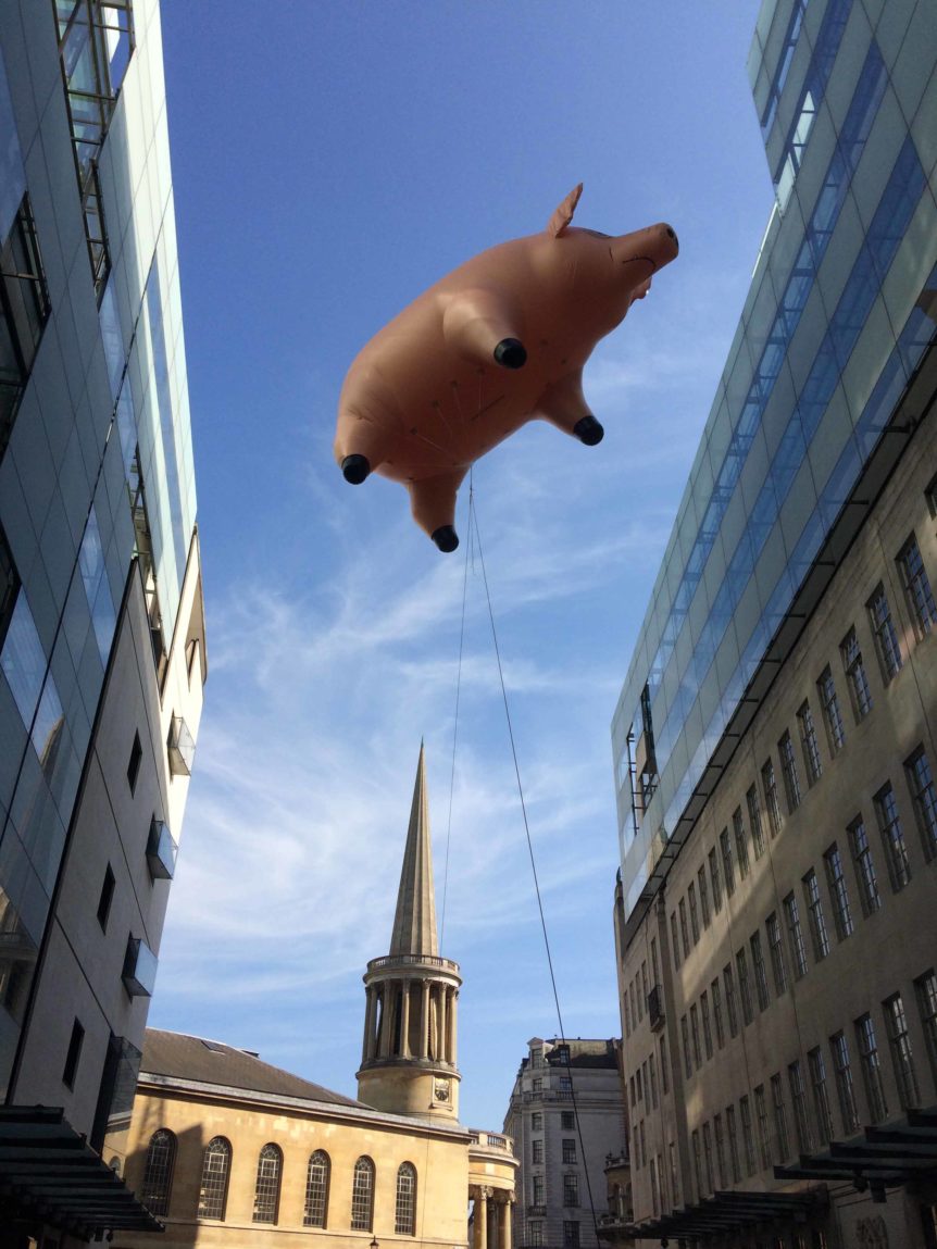 Looking up at the Pink Floyd pig floating above BBC